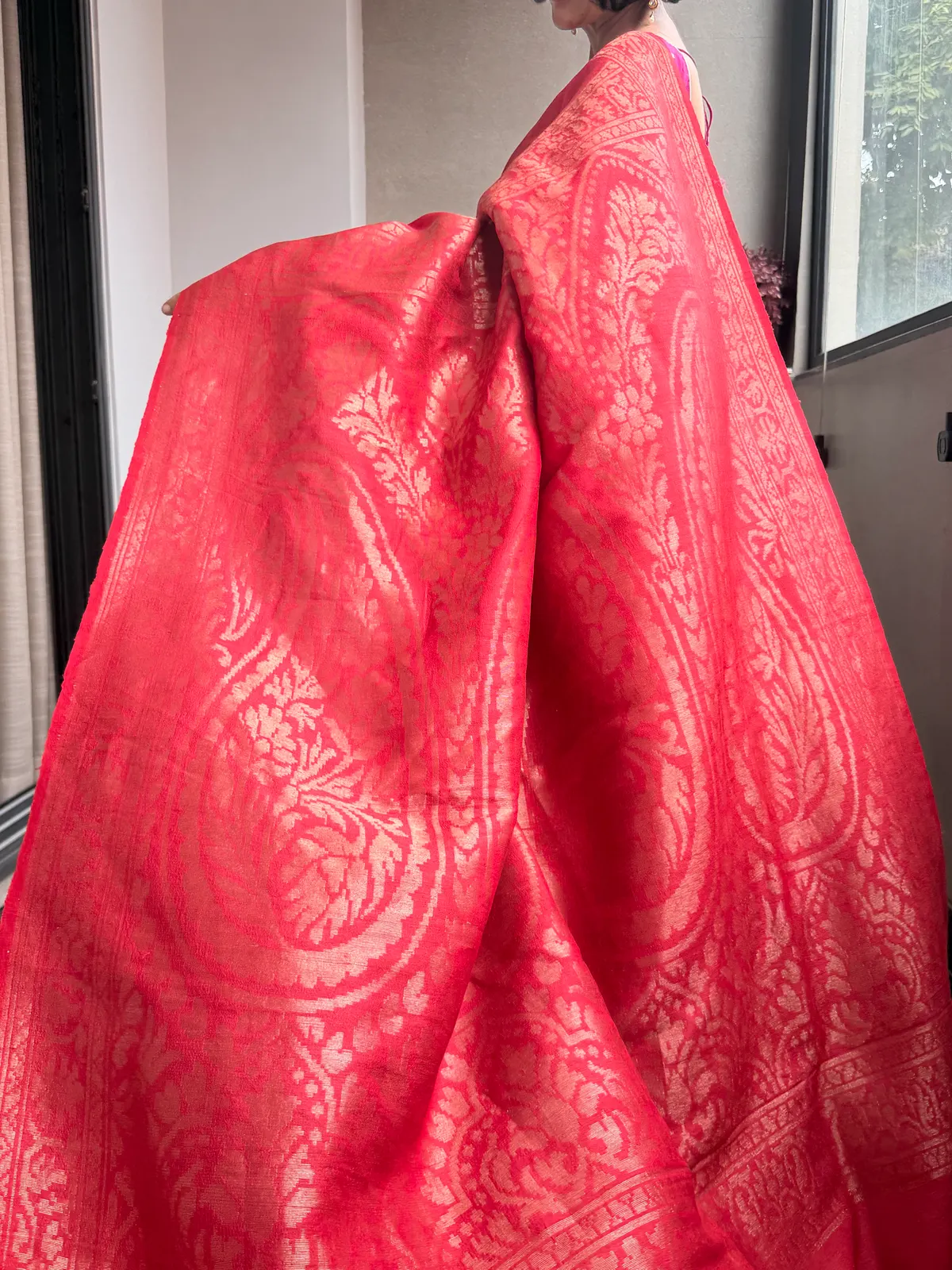 Kaduwa woven paisley pallu on red Tussar Banarasi saree